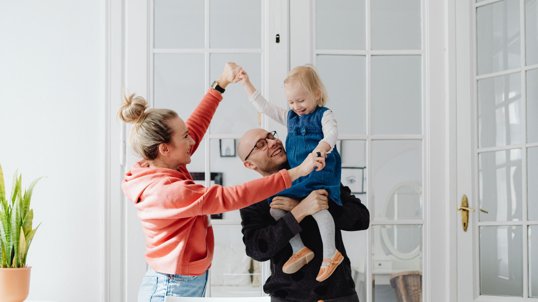 Family happily playing together