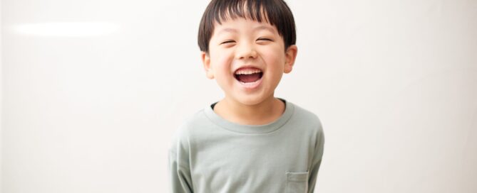 Child laughing and smiling