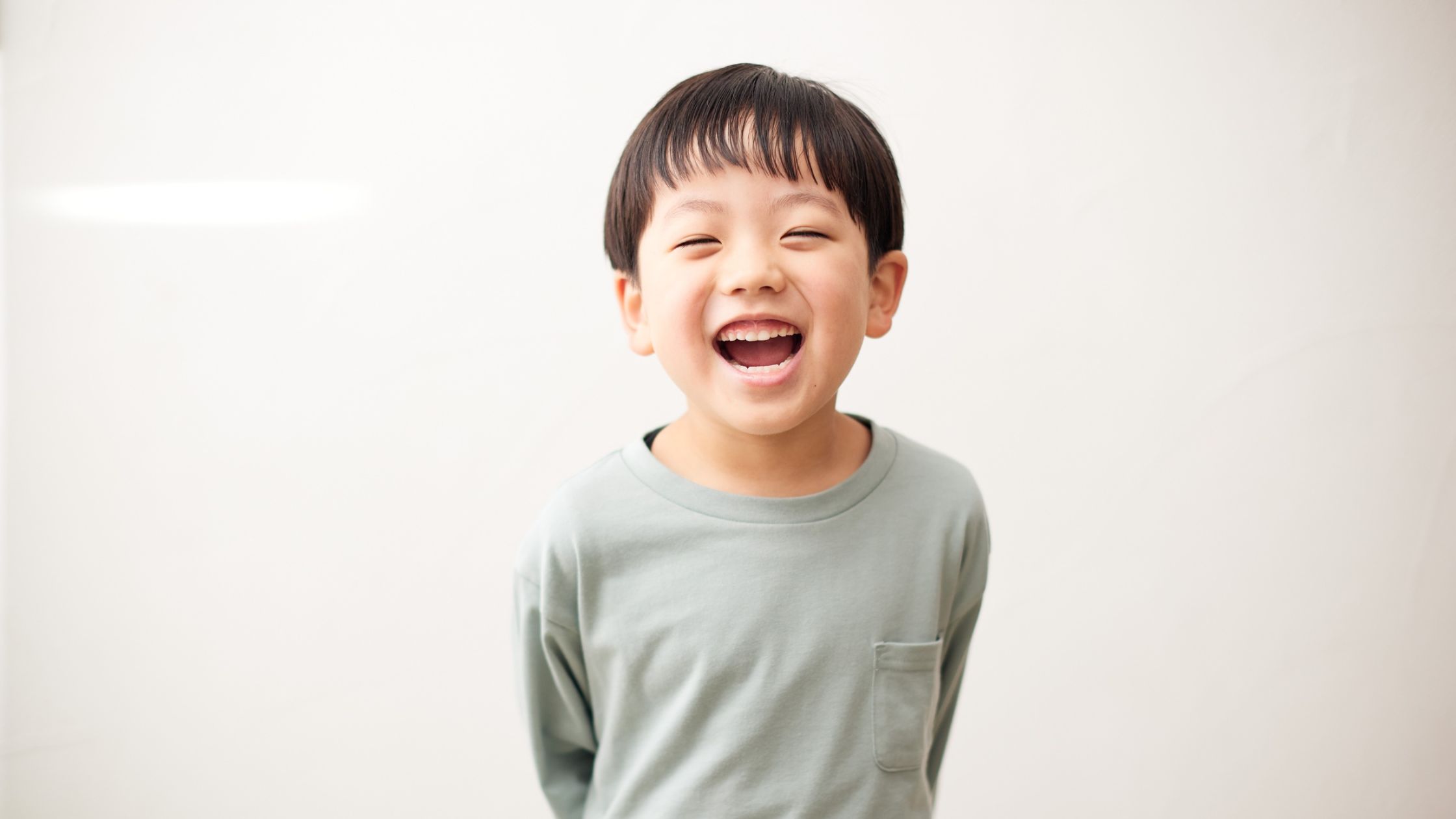 Child laughing and smiling