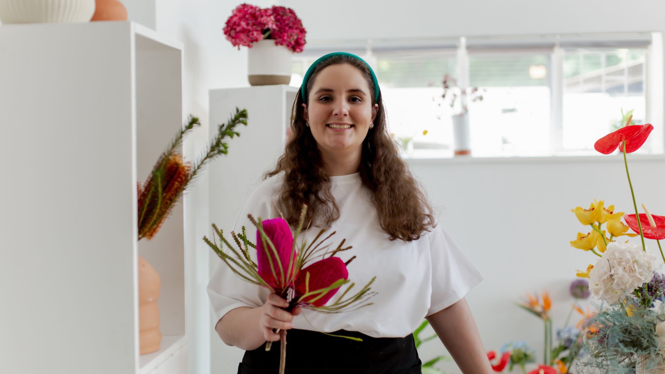 Adult holding a flower